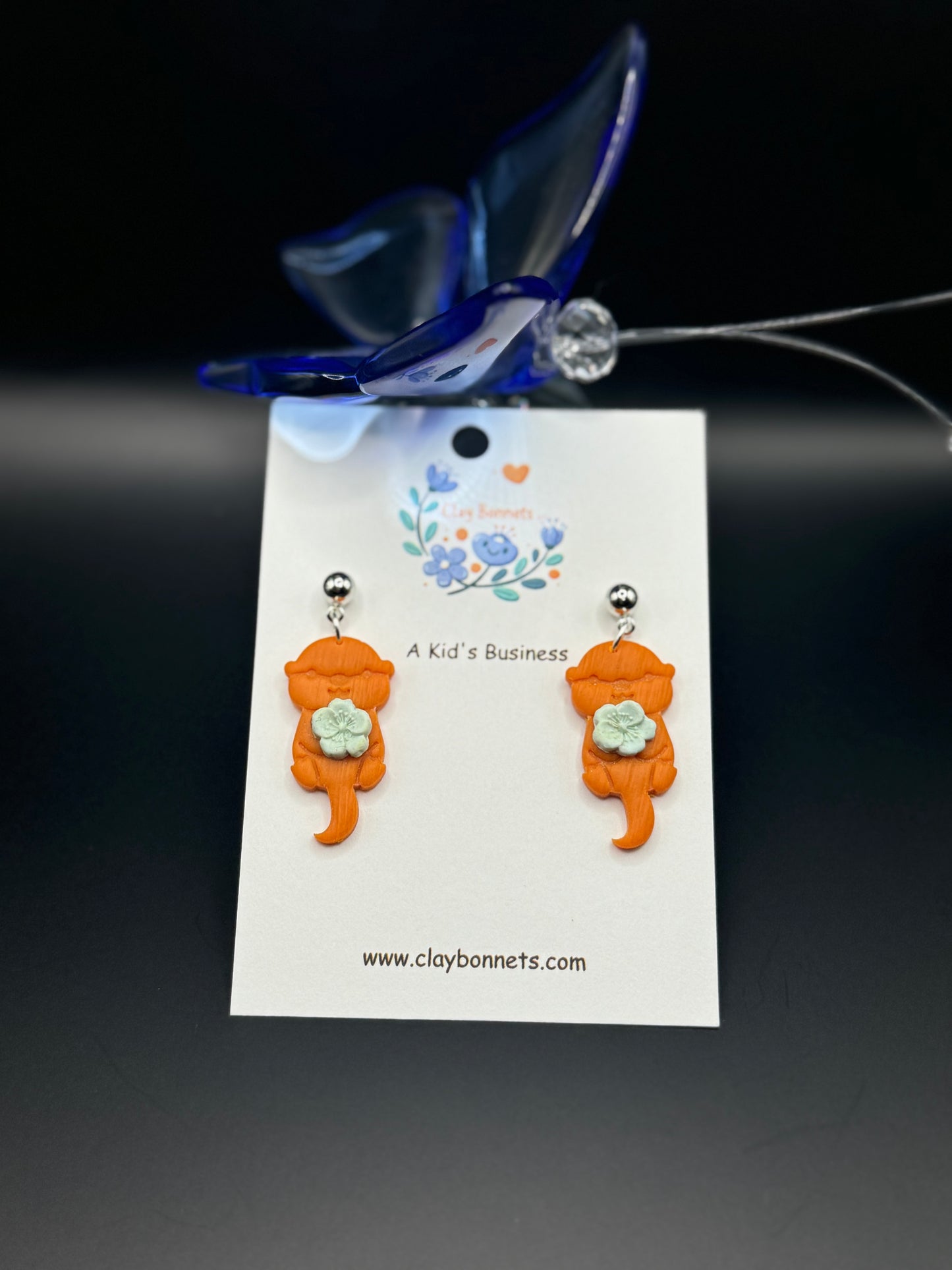 Cute Otter with a flower